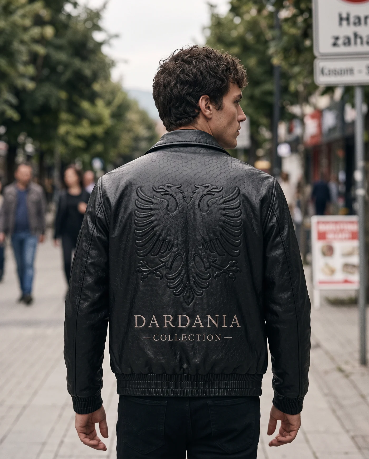 Dardania Leather in Zi, worn on the boulevard in Prishtina